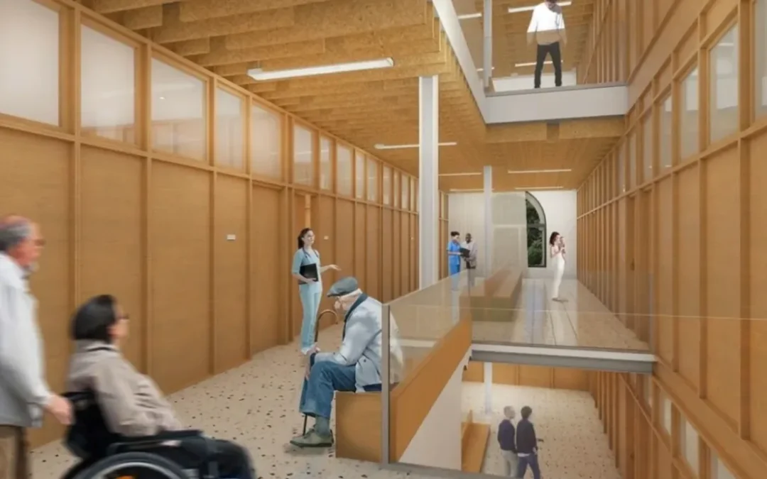 Zona de consultas y recepción del centro de salud, con acabados de madera