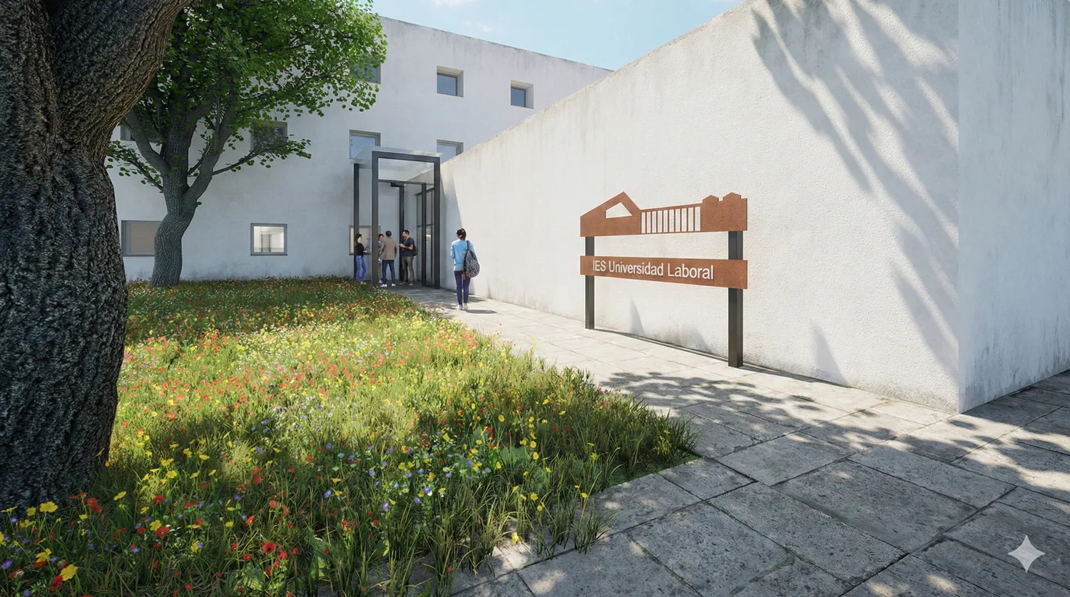 ender del acceso a la residencia de la Universidad Laboral de Cáceres, con la fachada rehabilitada y pradera de flores ender del acceso a la residencia de la Universidad Laboral de Cáceres, con la fachada rehabilitada y pradera de flores